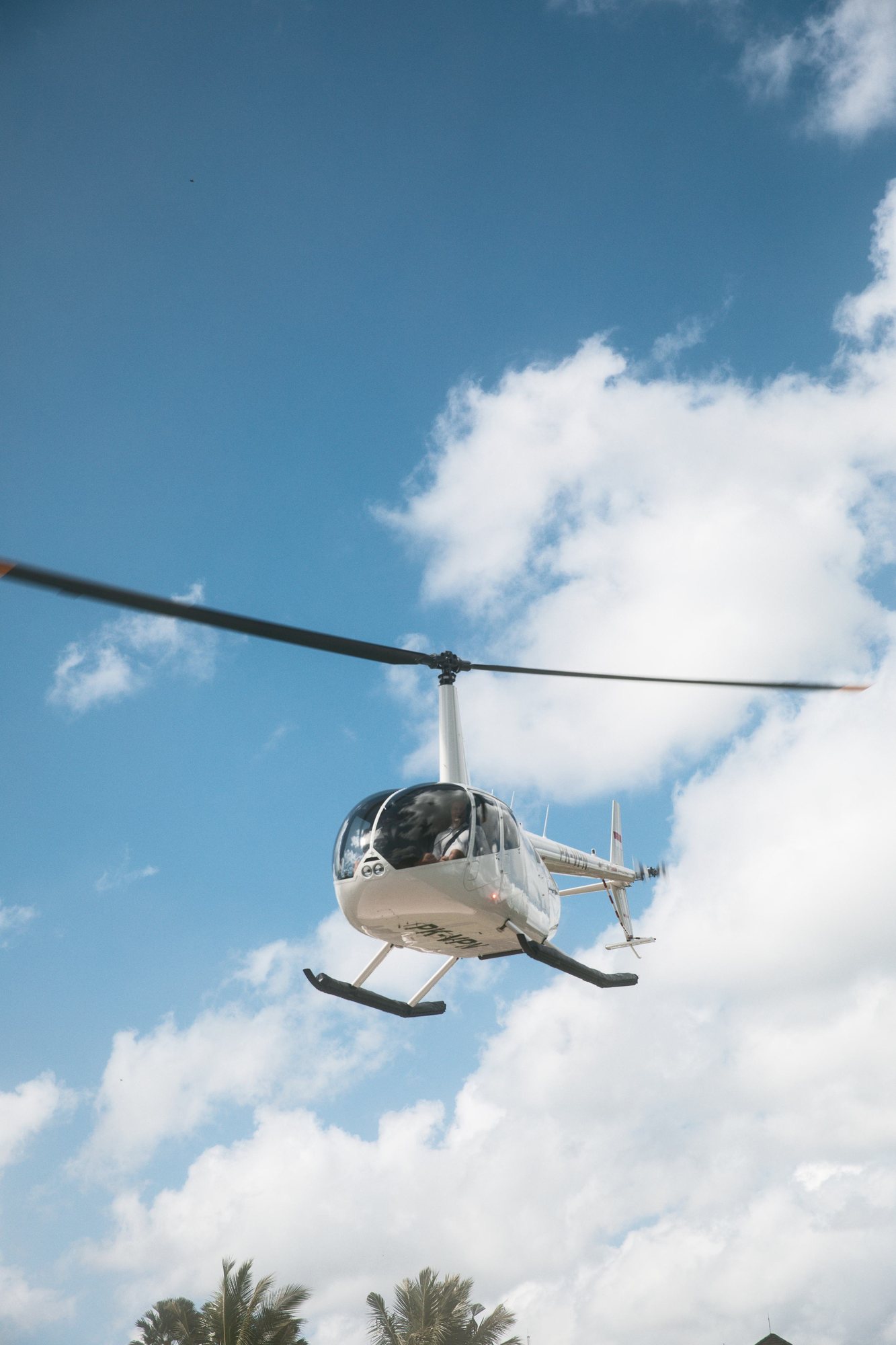 A Balicopter helicopter on the helipad, ready for departure